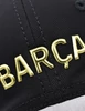 A Barça briliáns fekete-arany sapkája